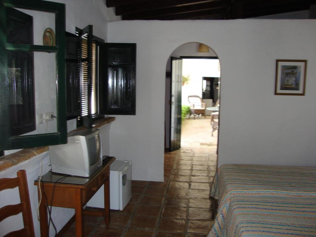 Alojamiento Cortijo el Caserio Hostal Conil De La Frontera Habitación foto